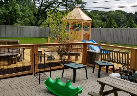 Playground with slide and seating area.
